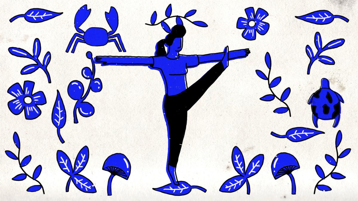 Illustration of a blue-colored woman balancing on one leg surrounded by plants, flowers, a crab, berries, mushrooms, and a turtle.