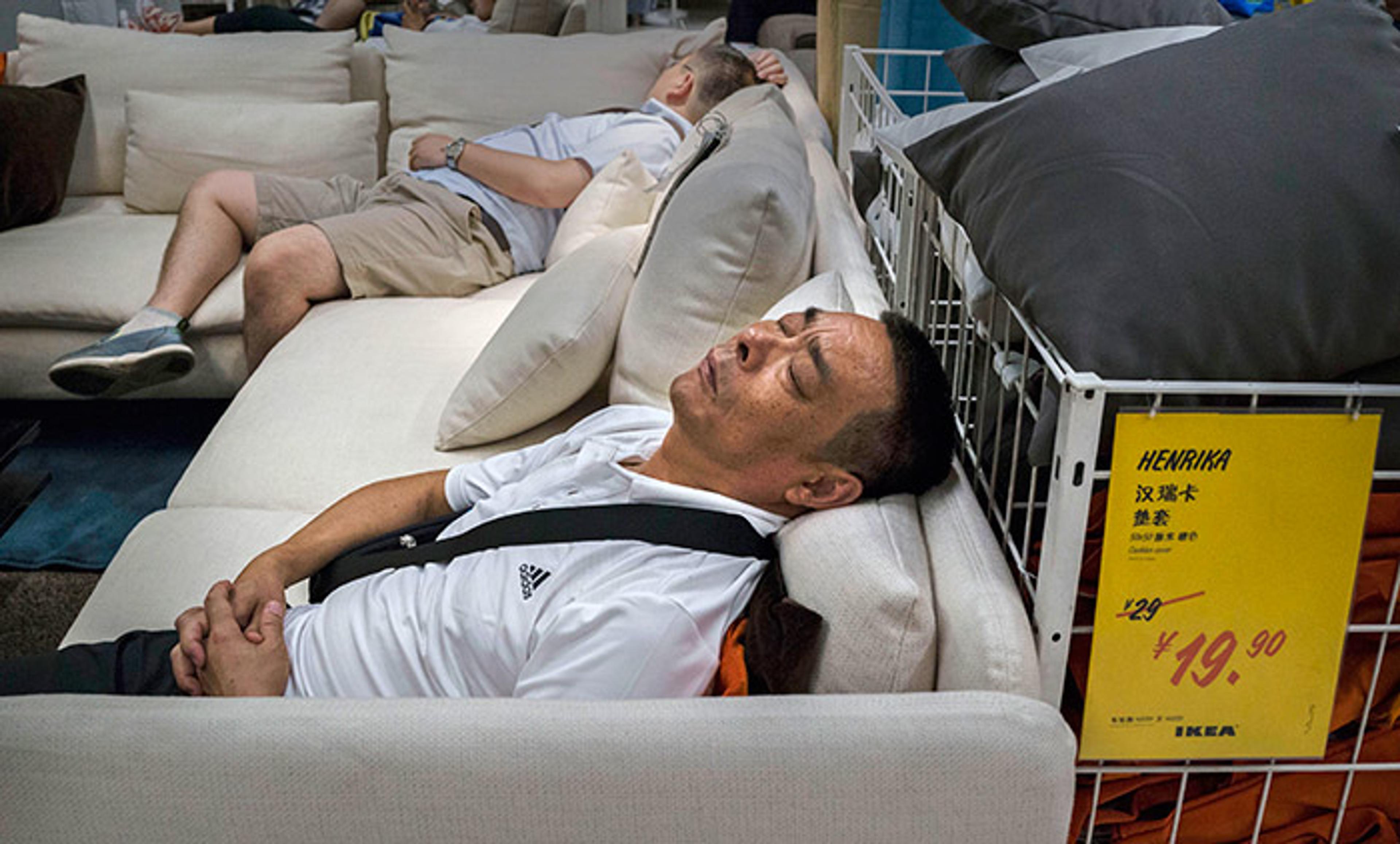 <p>All too much; Ikea shoppers overwhelmed in the showroom, 6 July 2014, Beijing, China. <em>Photo by Kevin Frayer/Getty</em></p>