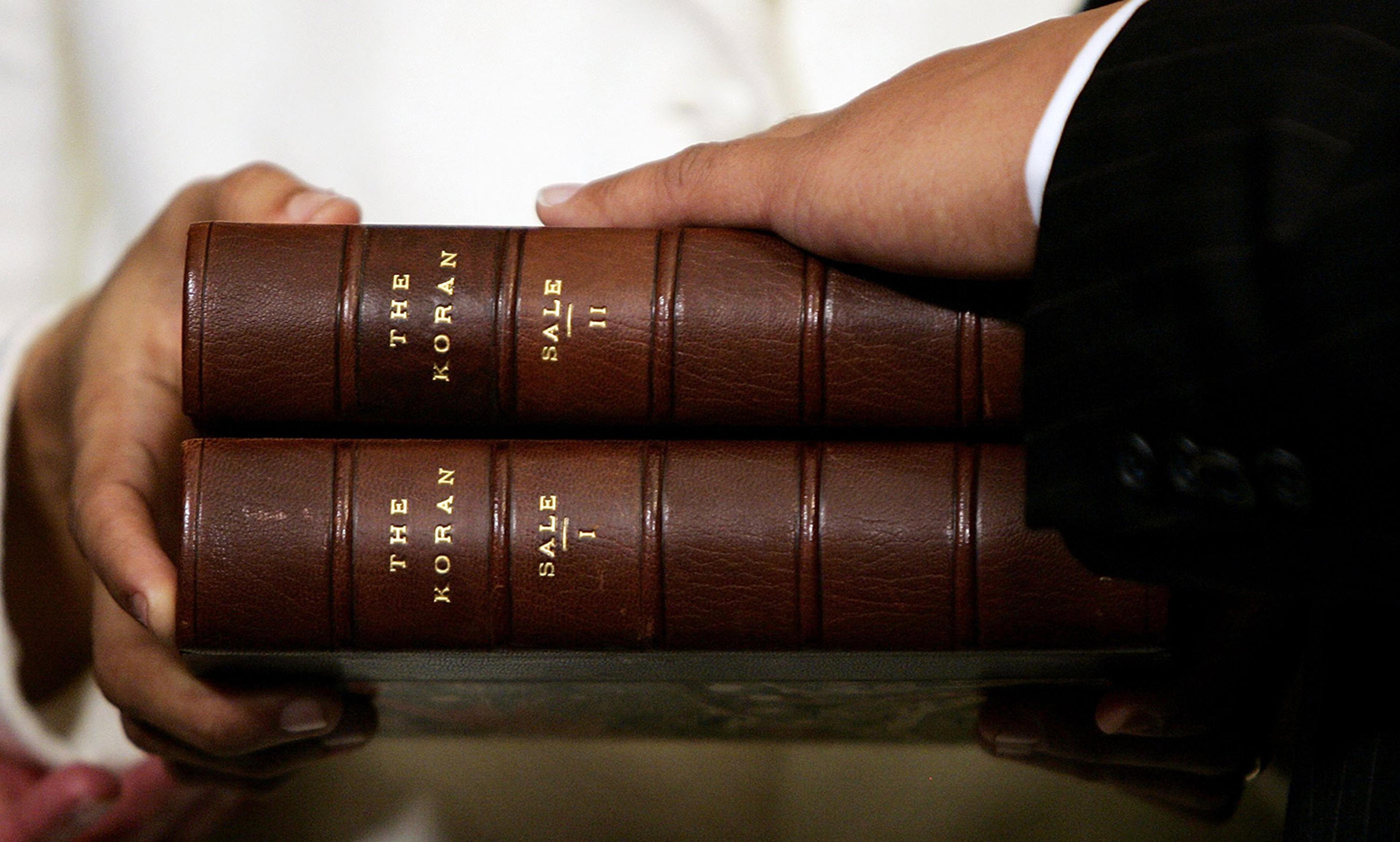 <p>Thomas Jefferson’s copy of George Sale’s 1734 translation of the Quran is used in the swearing in ceremony of US Representative Keith Ellison at the United States Capitol in Washington, DC, on 4 January 2007.<em> Photo by Getty</em></p>