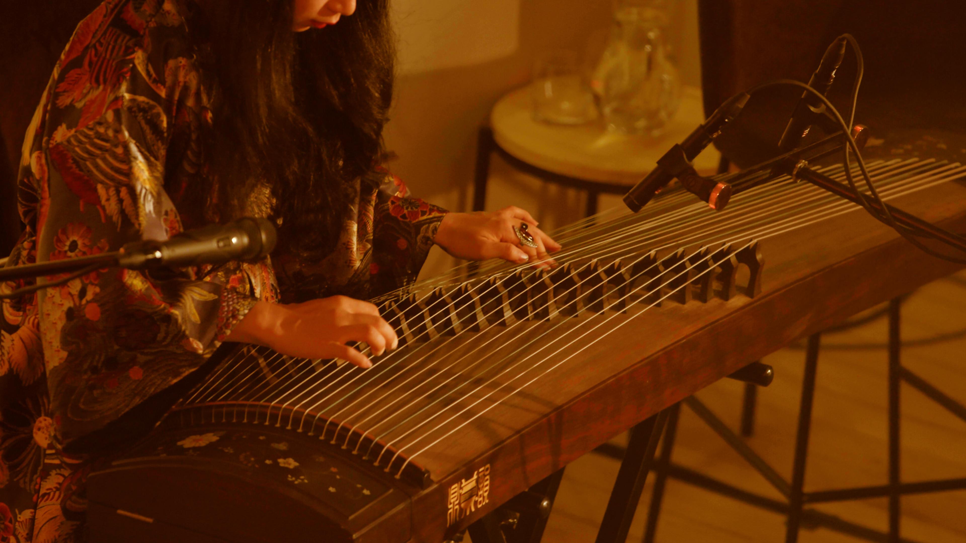 Mindy Meng Wang performing on stage