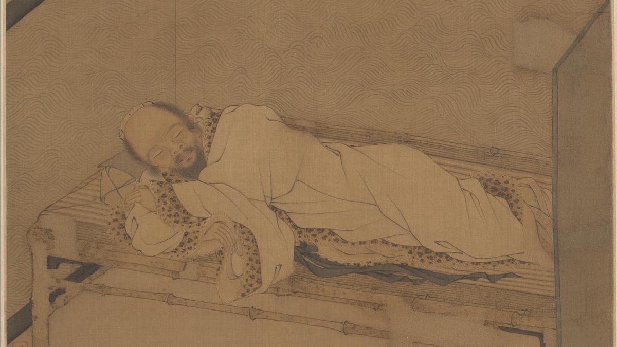 Painting of a bearded man lying on a wooden bed with a patterned robe, resting his head on his hand, slippers on floor.