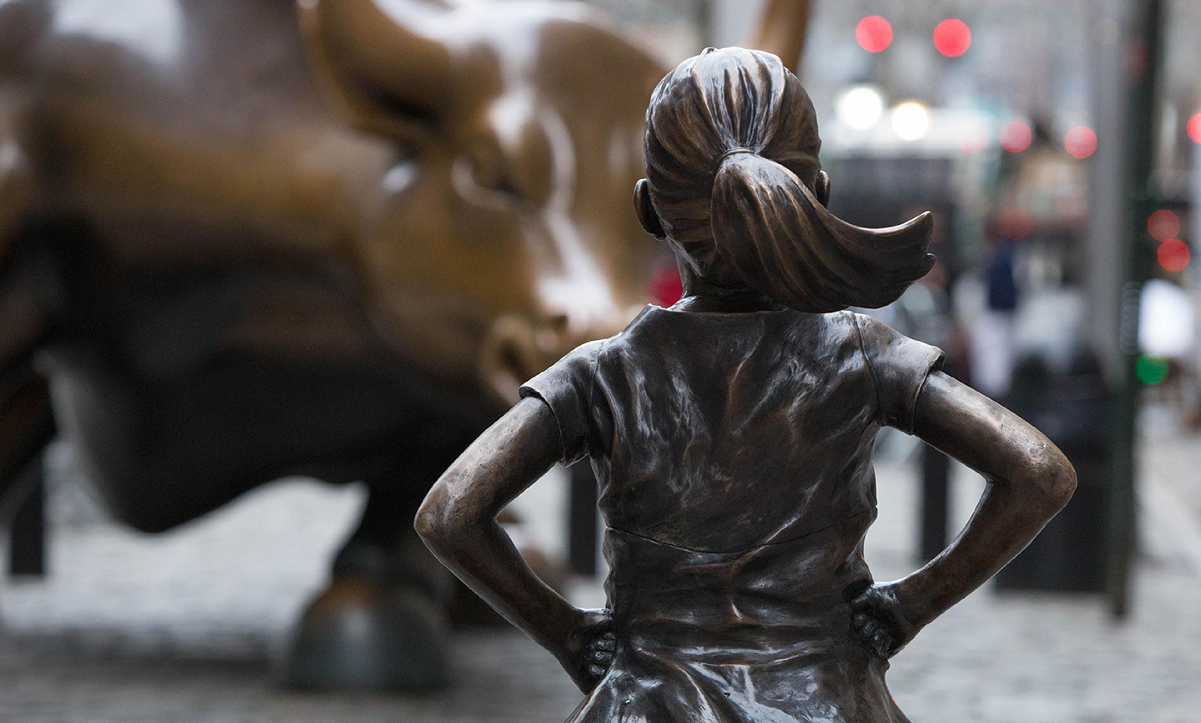 <p>Kristen Visbal’s <em>Fearless Girl</em> statue in front of Wall Street’s iconic bull. <em>Photo by Anthony Quintano/Flickr</em></p>