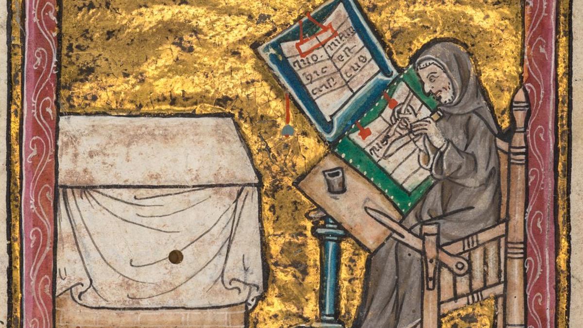 Medieval painting of a scribe in a hooded robe writing on a large manuscript at a tilted desk with a gold background.