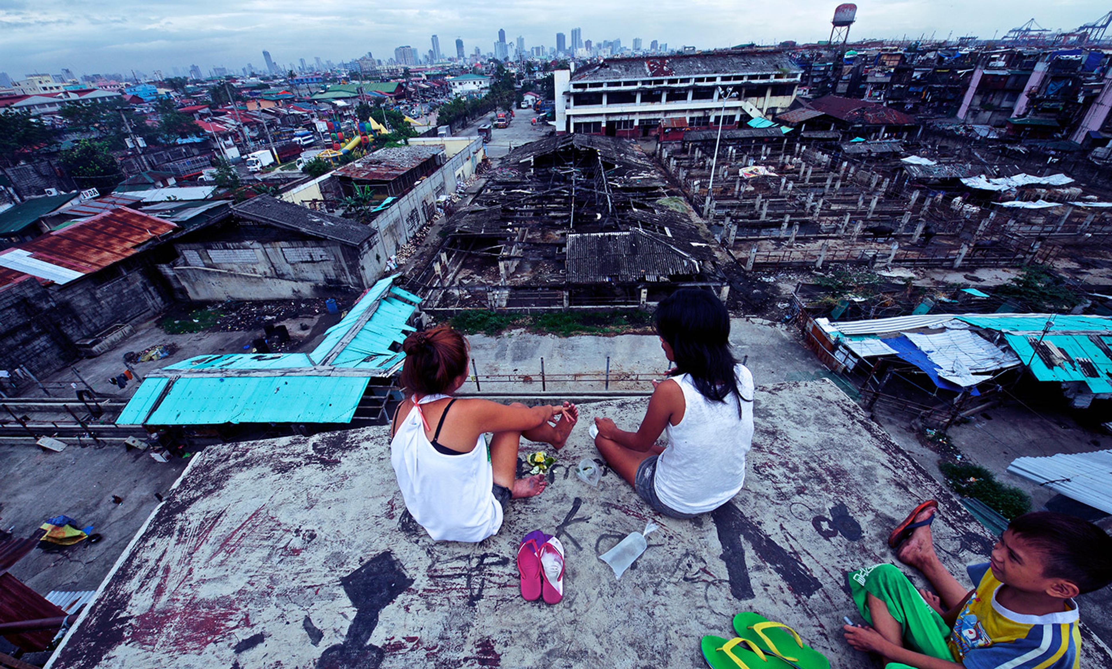 <p>Relaxing on a Manila rooftop. <em>Photo by John Christian Fjellestad/Flickr</em></p>