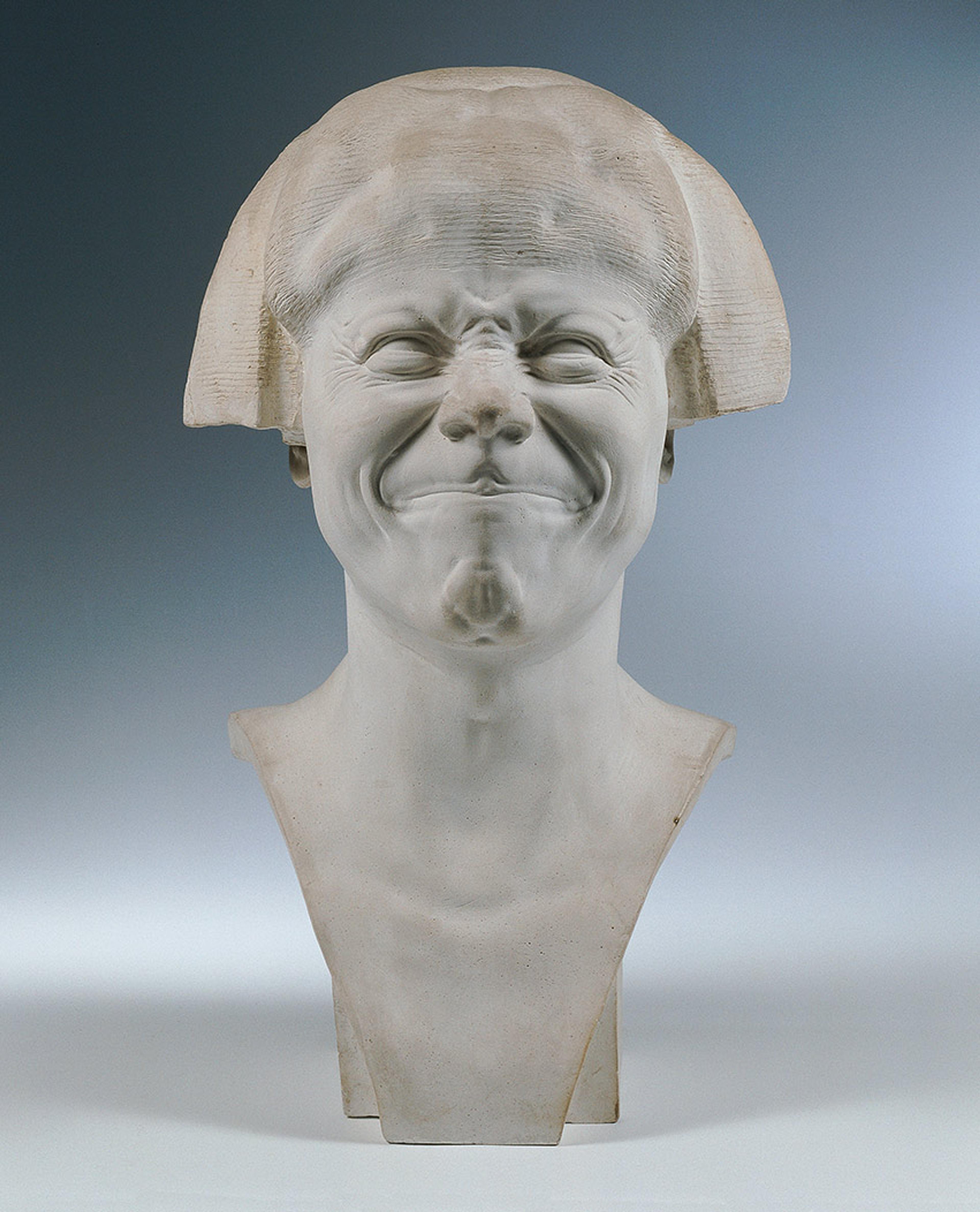 Bust of a person with scrunched expression.