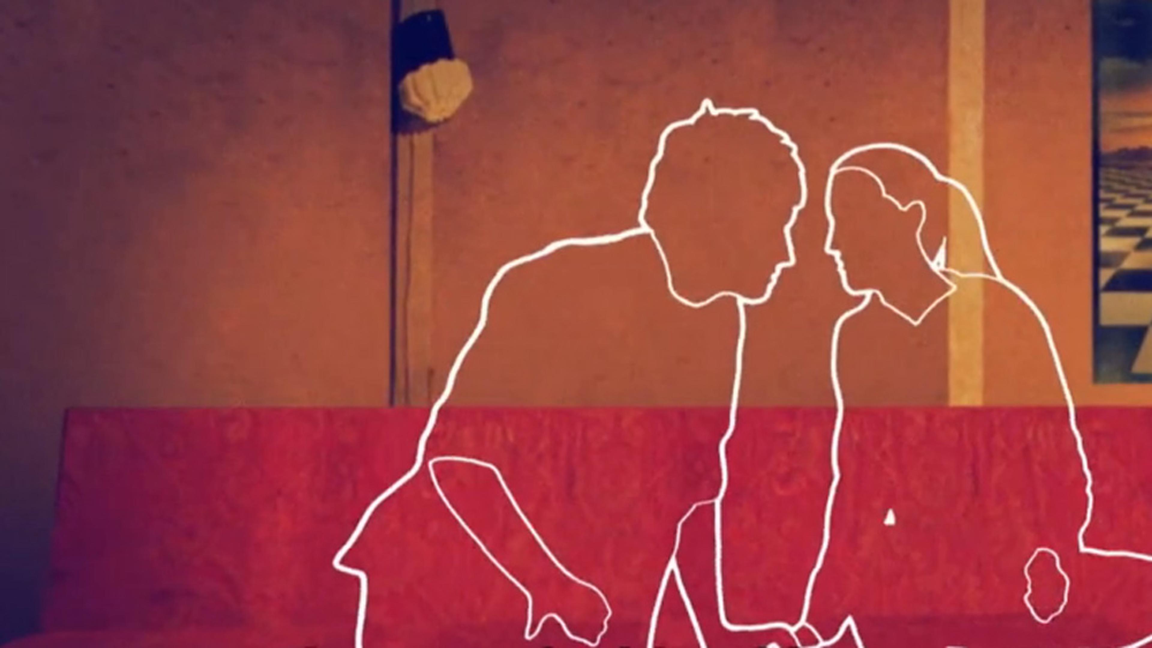 Digital drawing of two outlined figures leaning towards each other for a kiss in front of a red sofa. Background includes a wall and framed picture.