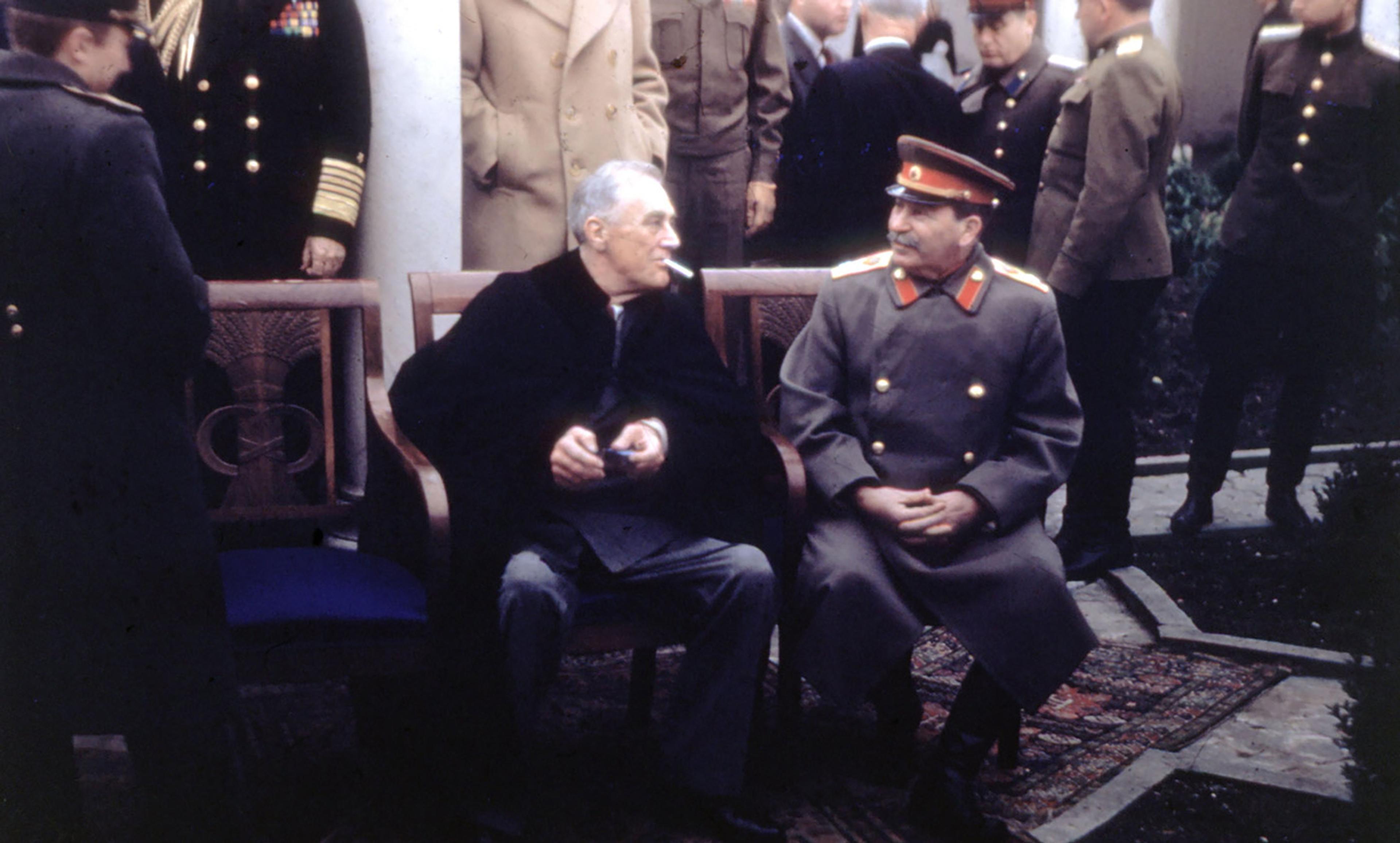 <p>Roosevelt and Stalin share a moment at Yalta. <em>Getty Images</em></p>