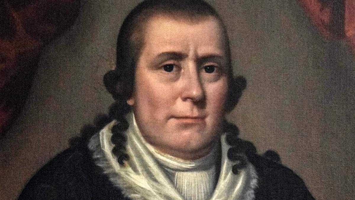 Painting of a man wearing a black coat and white ruffled cravat against a dark background.