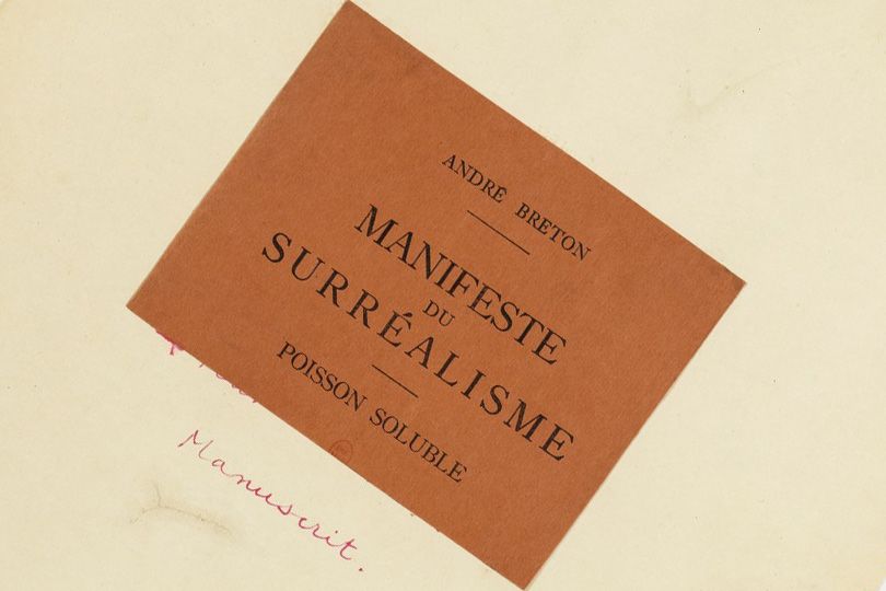 Image of a document cover titled “Manifeste du Surréalisme” by André Breton, featuring handwritten “Manuscrit”.