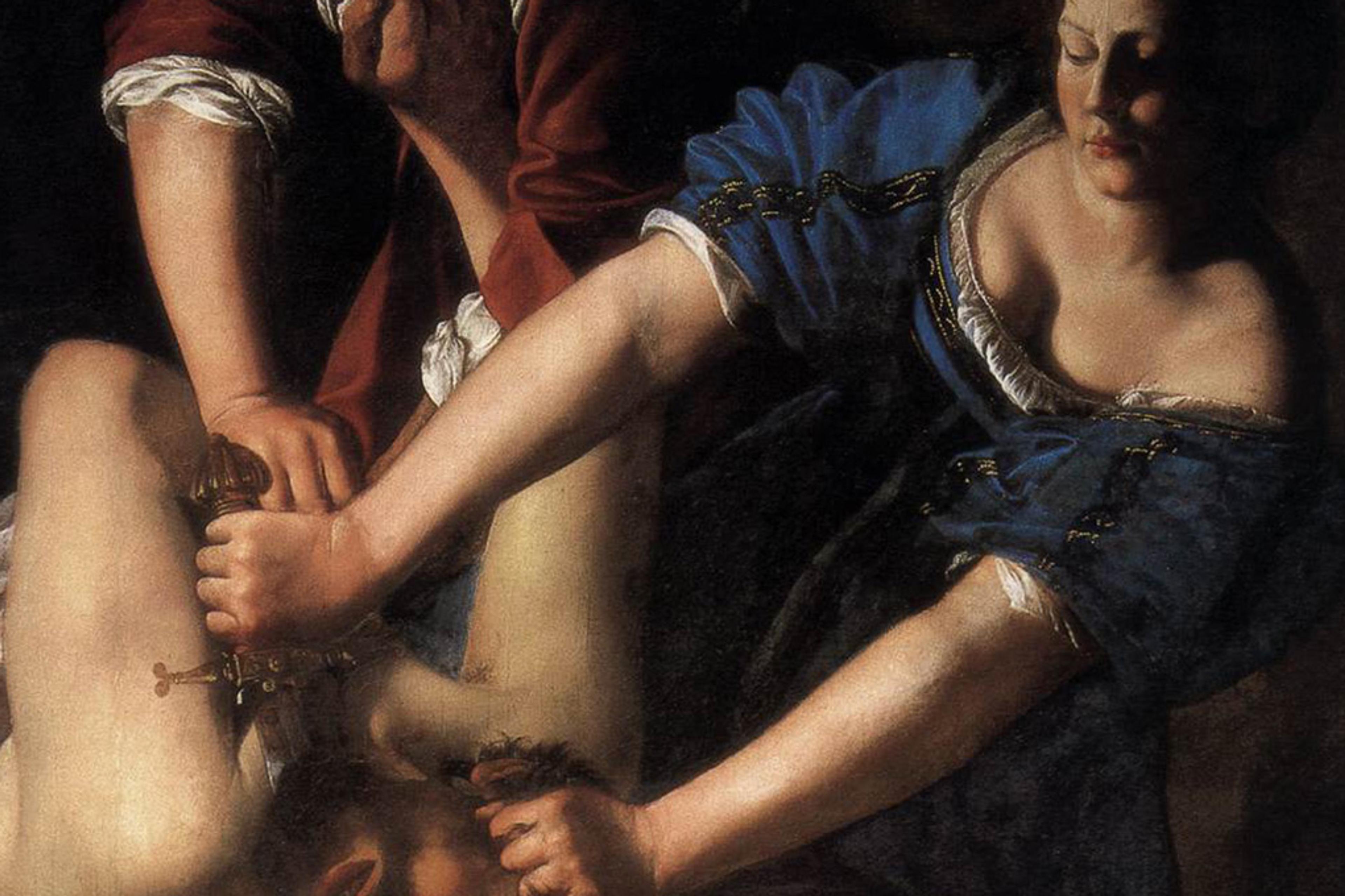 Painting of two women in historical clothing beheading a man, with one holding him down while the other uses a sword.