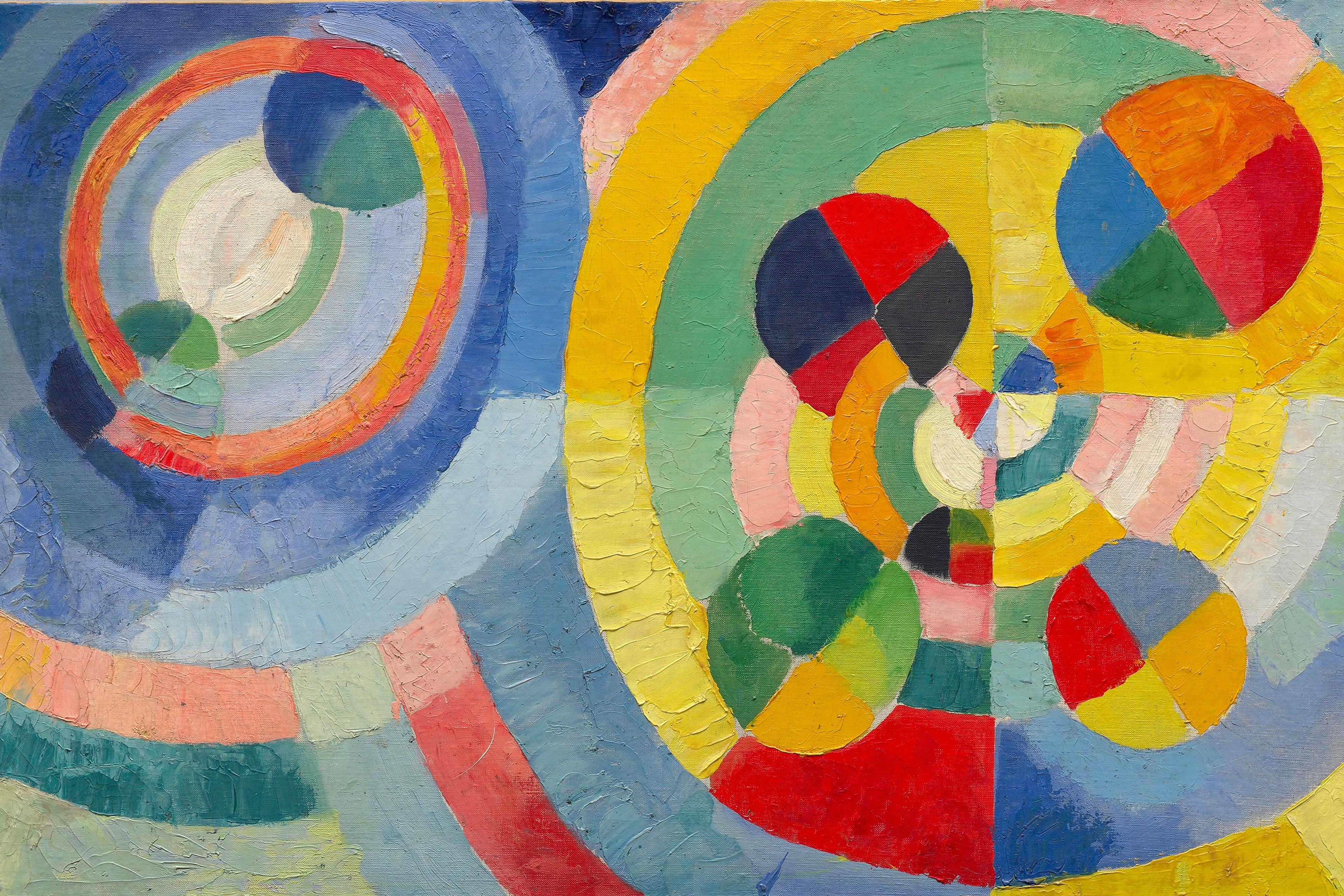 Abstract painting with colourful overlapping circles and segments creating dynamic patterns and contrasts.