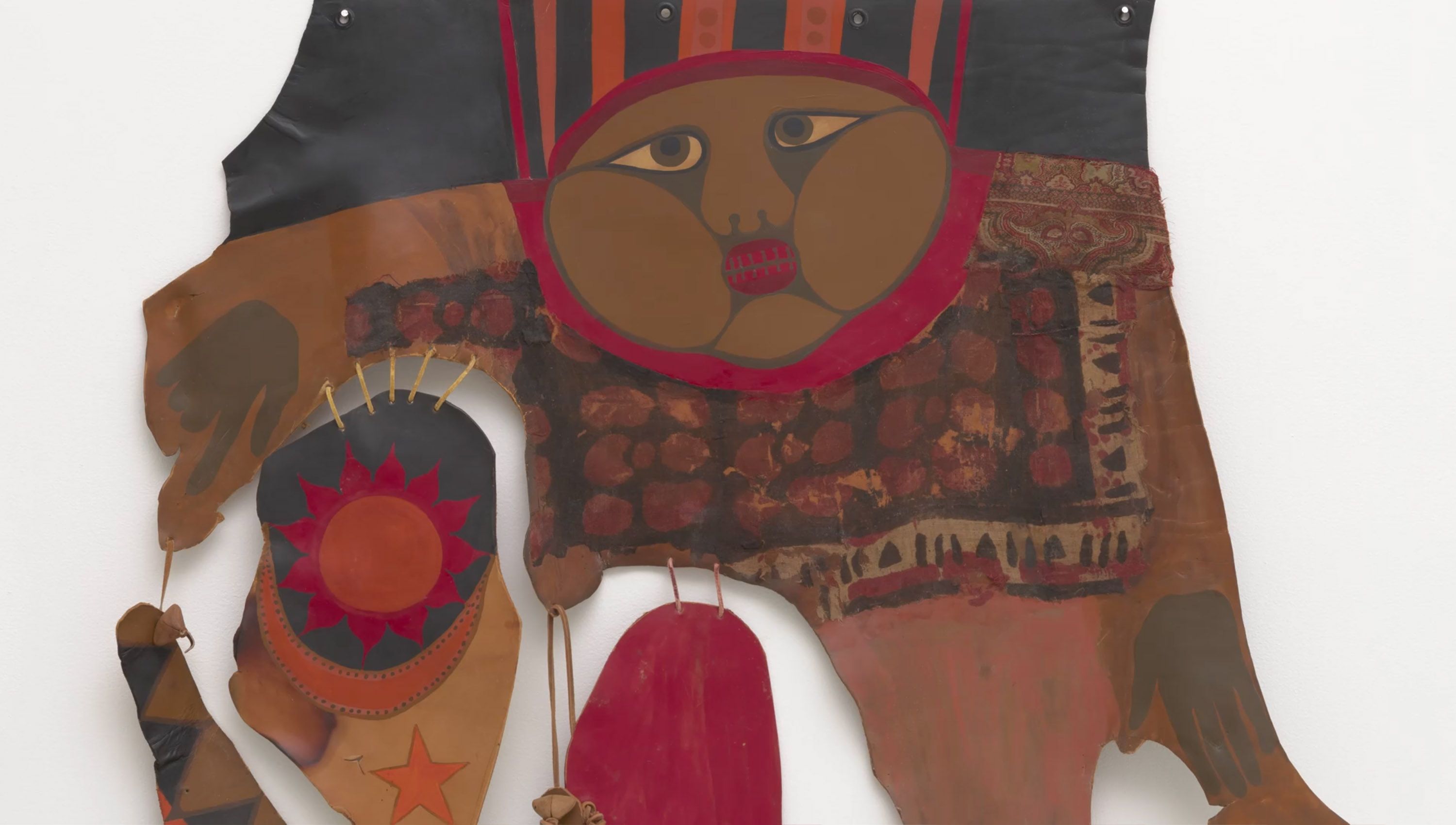 Mixed-media artwork featuring a stylised face with large cheeks, vibrant red accents and abstract shapes on a textured background.