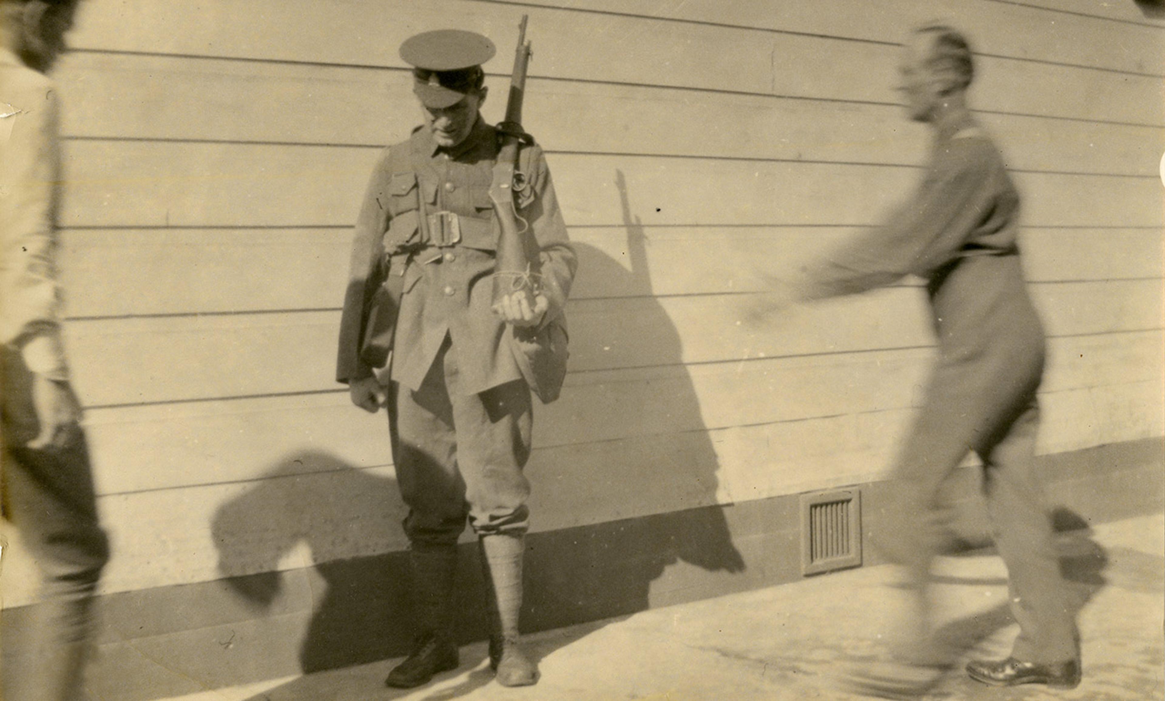 <p>A conscientious objector Thomas Moynihan being abused at Wanganui Detention Barracks New Zealand, 1918. <em>Photo Archives New Zealand/Flickr</em></p>