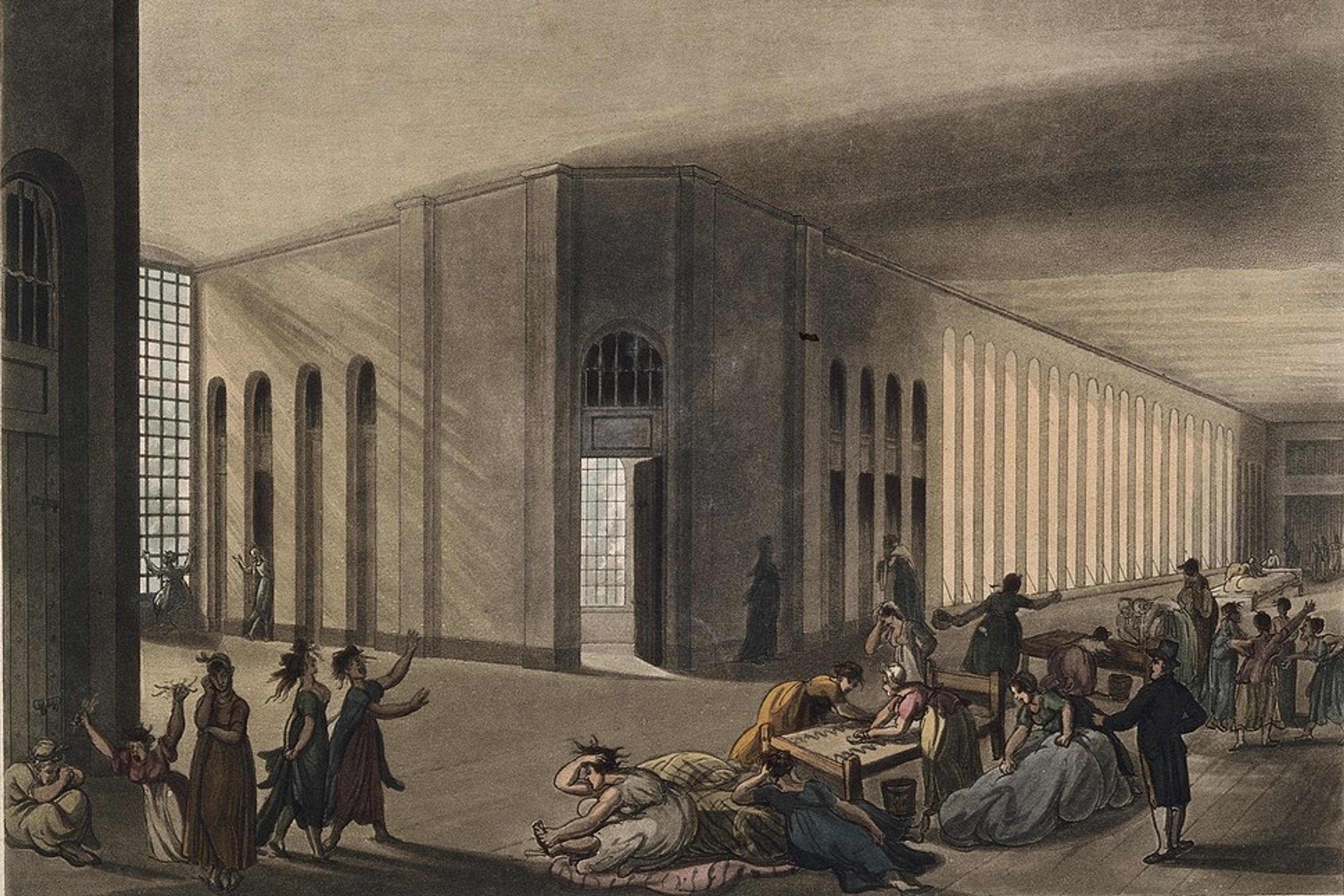 Engraving of St Luke’s Hospital interior with patients and staff, featuring large windows and arched architecture.
