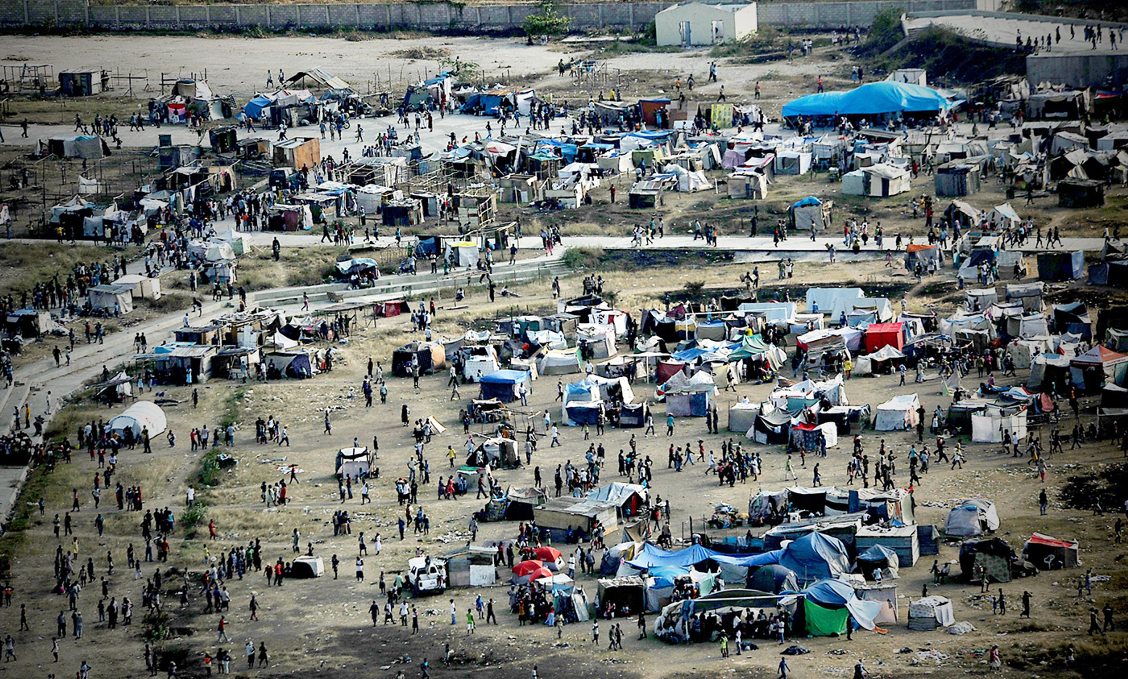 <p>Makeshift shelters in Port-au-Prince, 2010. <em>Photo courtesy US Air Force</em></p>