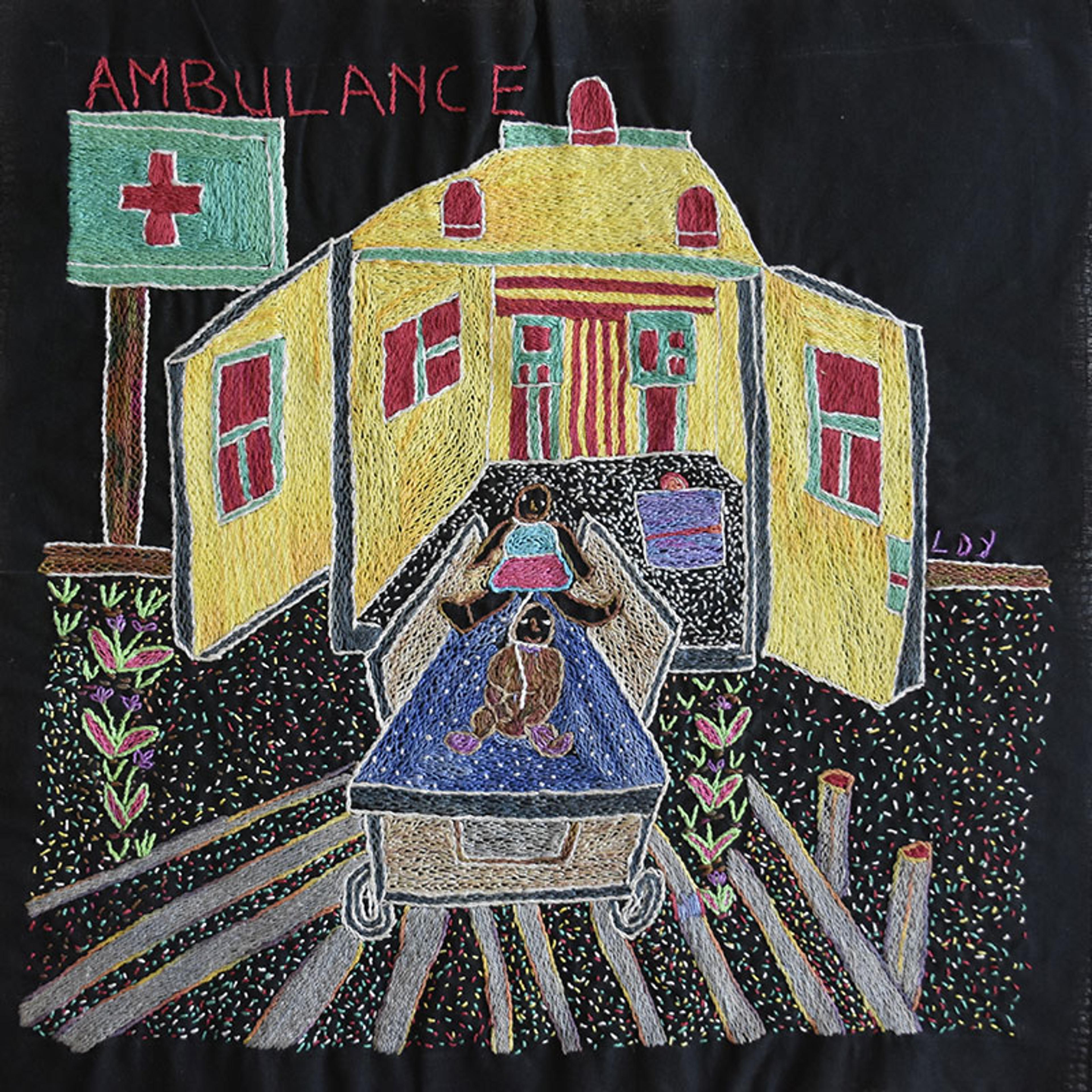 Embroidered artwork showing an ambulance with the doors wide open, with a woman on a stretcher who has given birth to a baby.