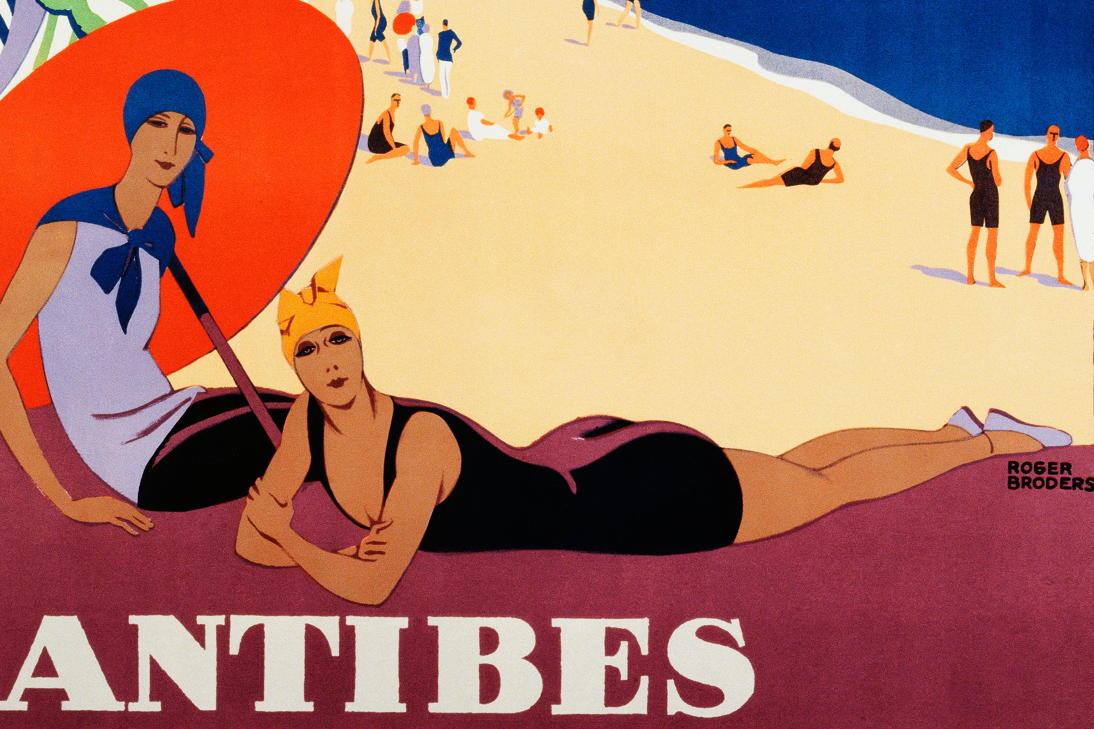 Vintage poster by Roger Broders showing a seaside scene with sunbathers and swimmers on Antibes beach.