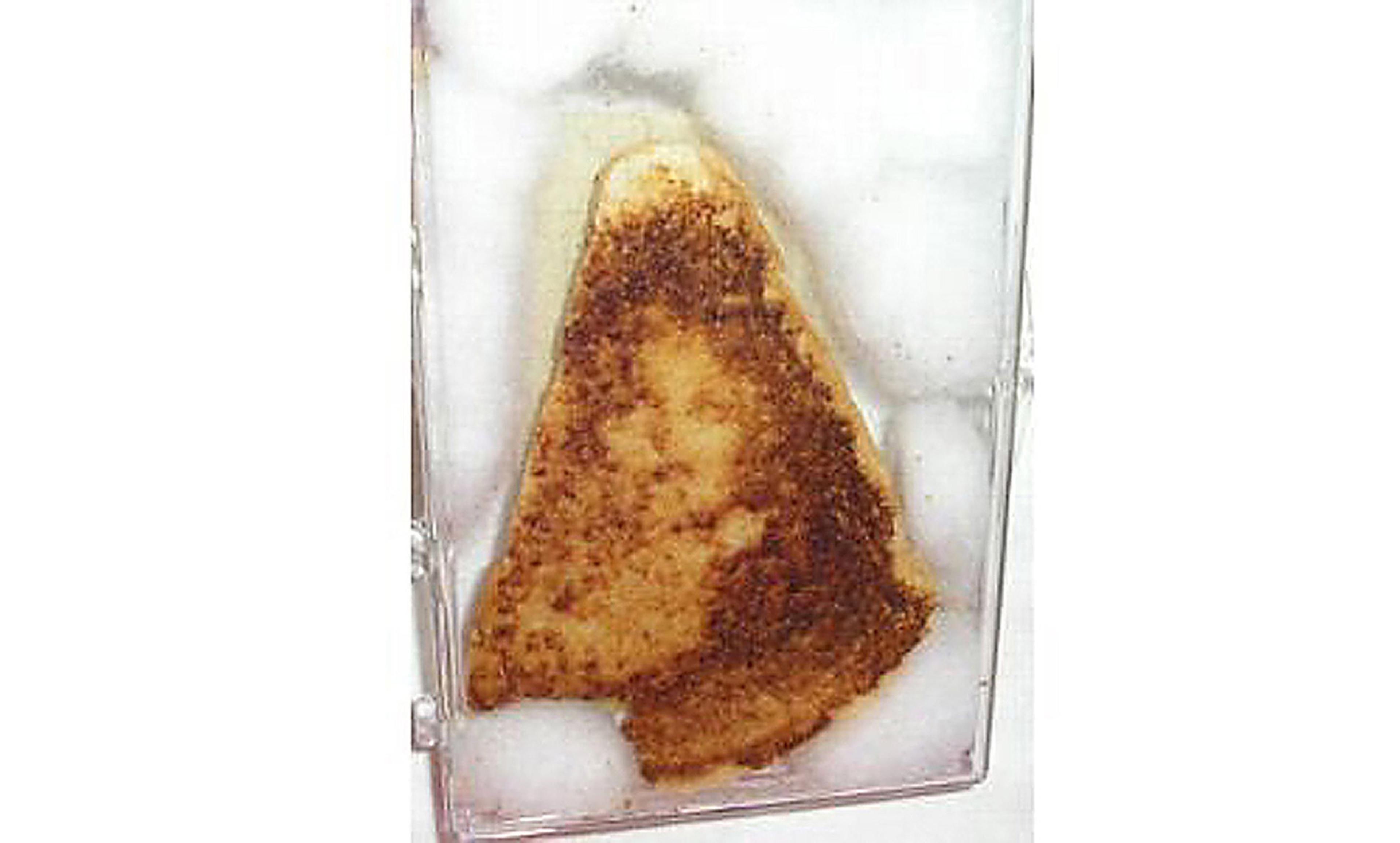 <p>The Virgin Mary appeared on a ten-year-old cheese sandwich. <em>Photo courtesy Ebay/Getty</em></p>
