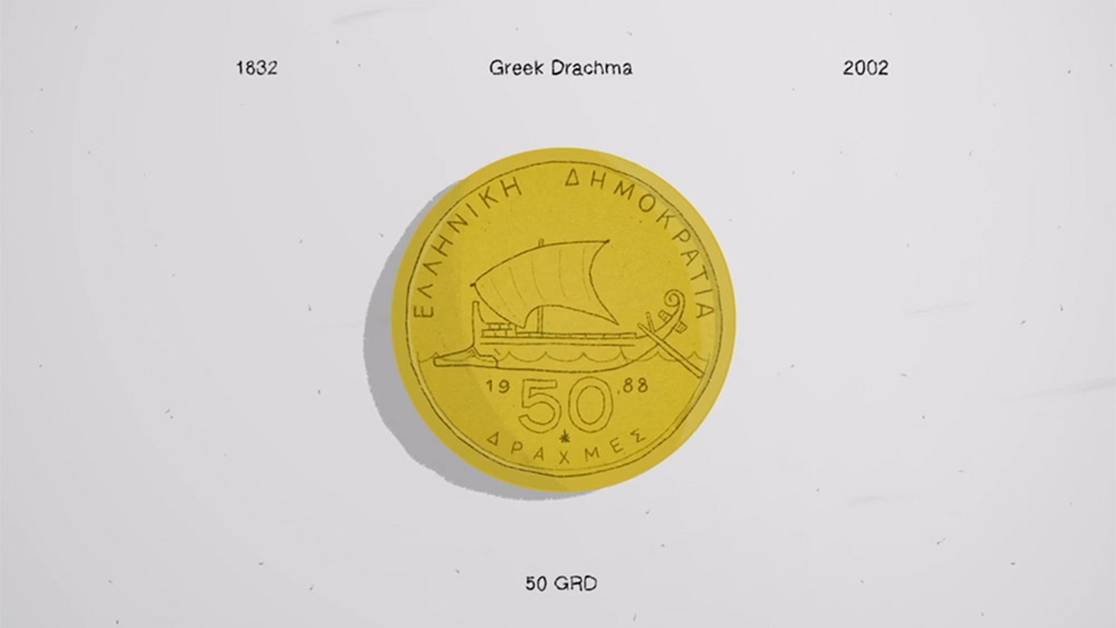 Image of a 50 Greek drachma coin with a sailing ship, text in Greek. Dates 1832 and 2002 at the top, labels 50 GRD at the bottom.