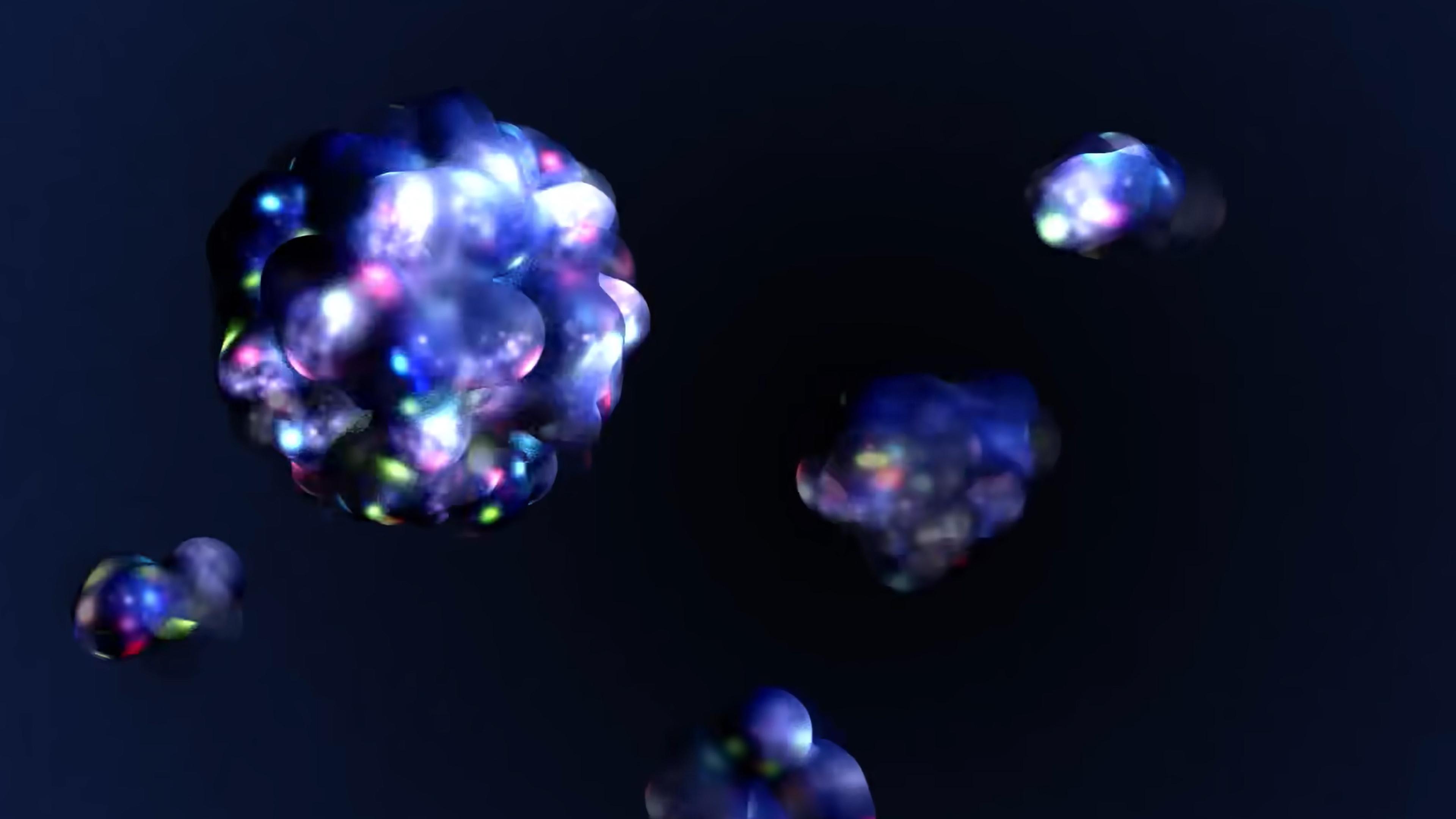 Abstract digital art of glowing, multicoloured clusters against a dark background, resembling molecules in space.