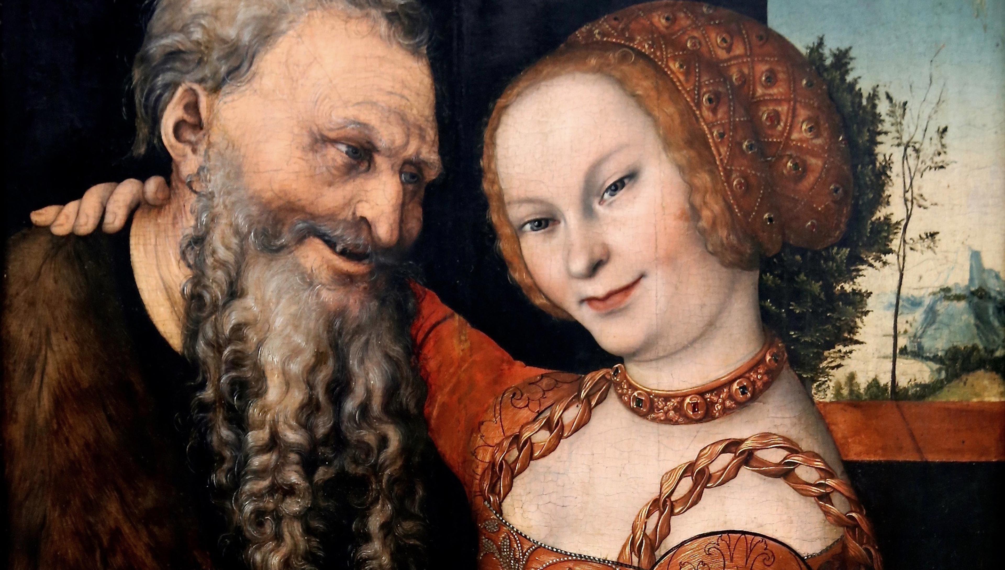 A painting of an older man with a beard smiling at a young woman with braided hair in a red dress, their heads close together.