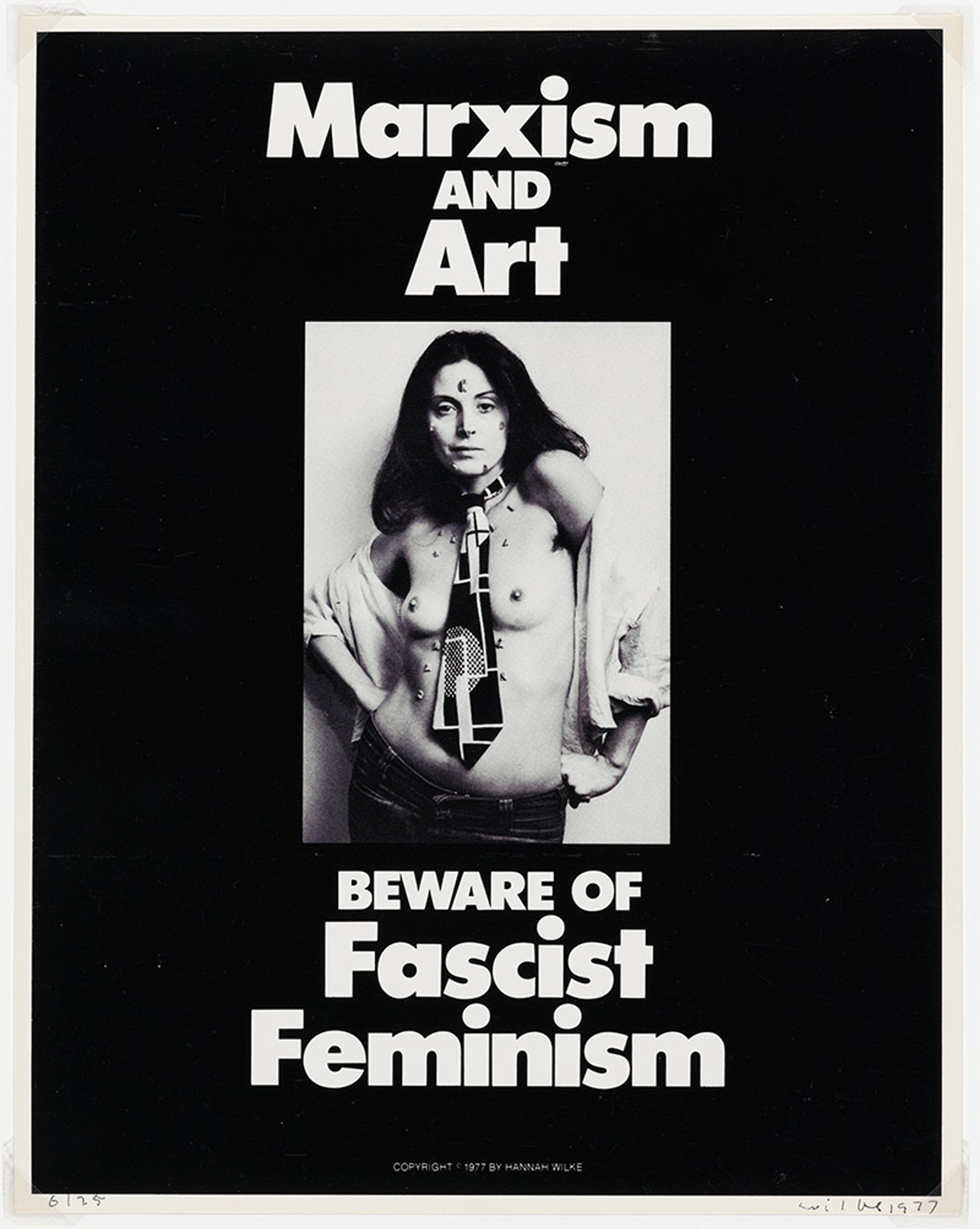 A black and white poster with the words “Marxism and Art” at the top, an image of a topless woman, and “Beware of Fascist Feminism.”