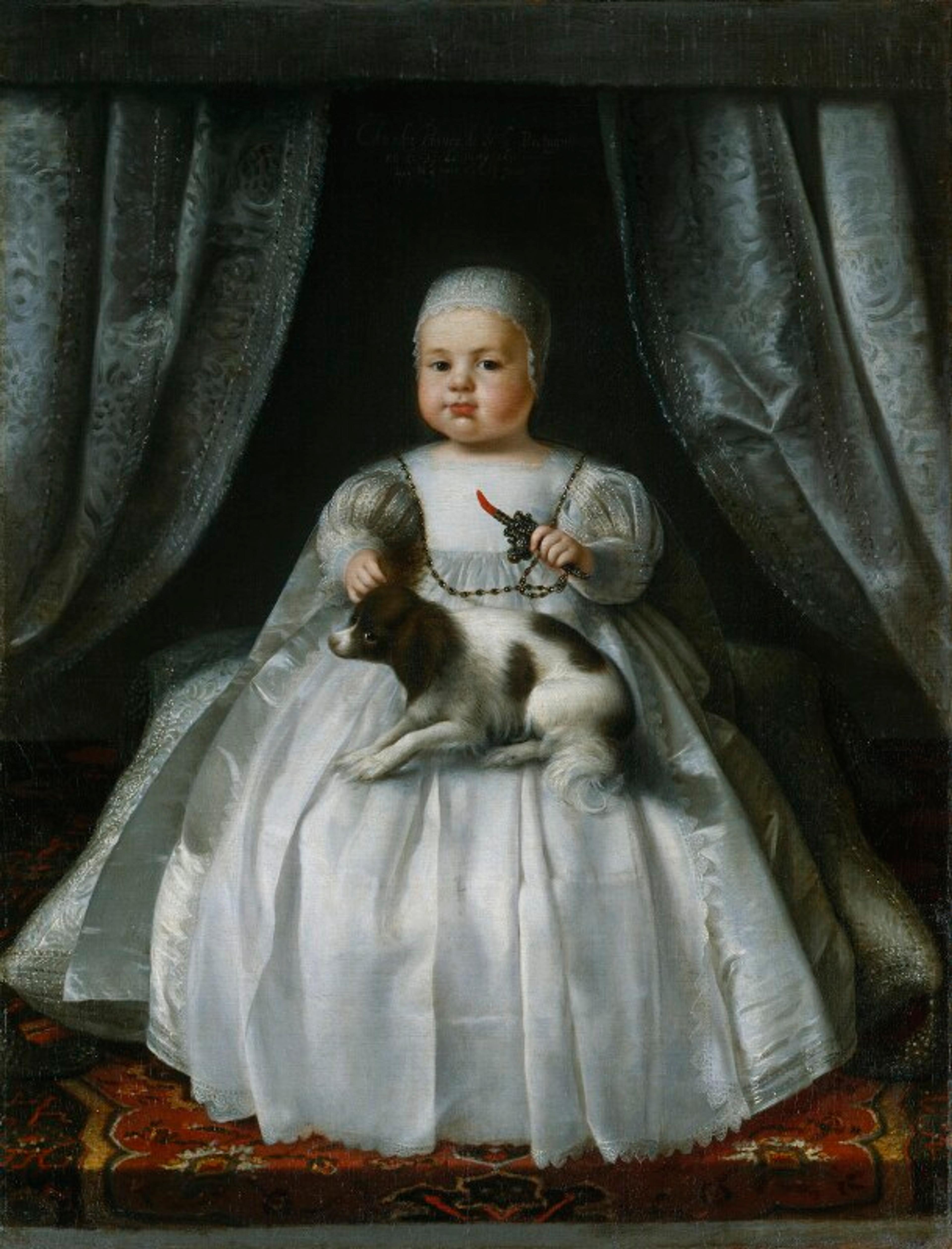 Period painting of a child in a white gown sitting on a chair with a small dog in their lap, detailed curtains and a carpet in the background.