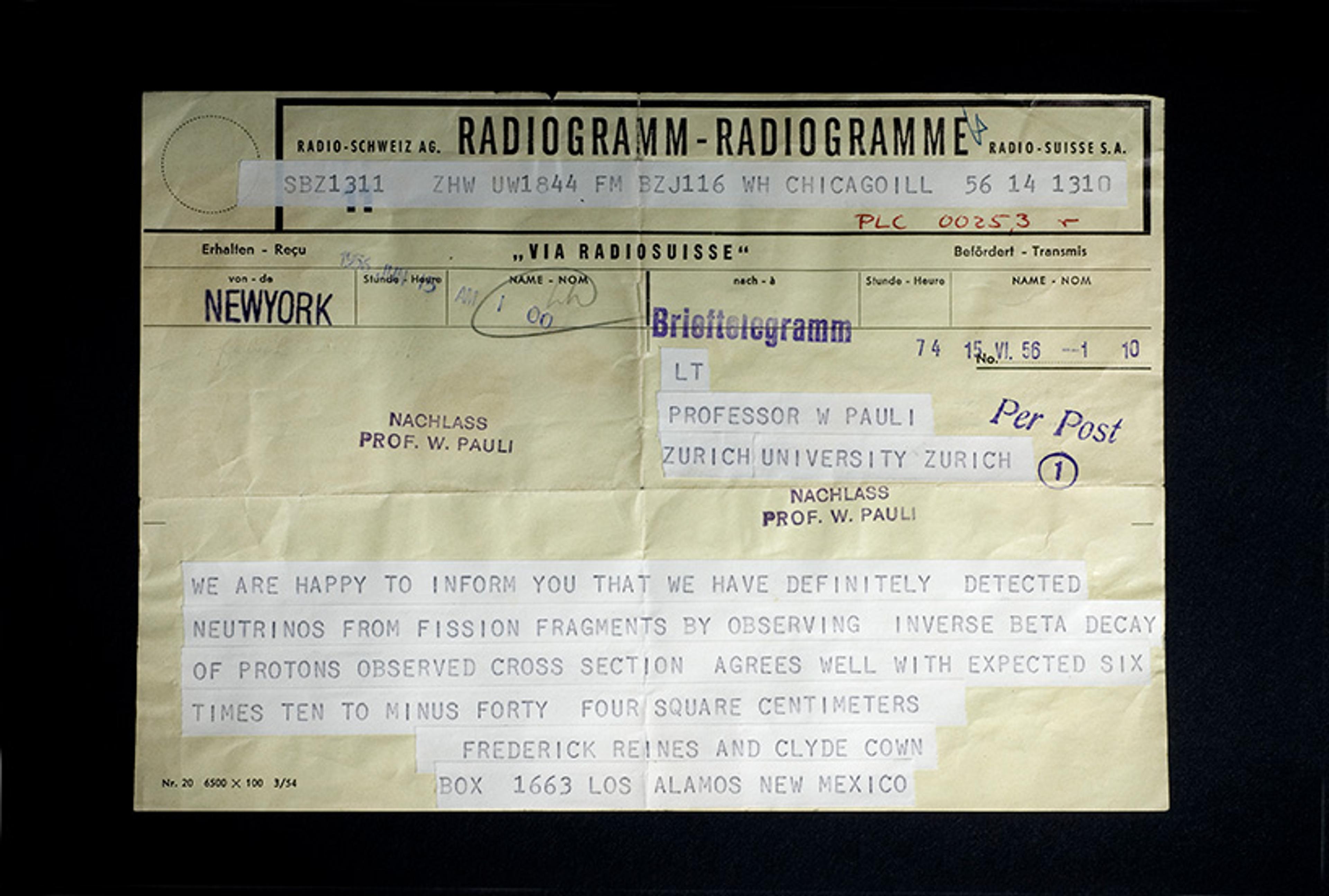 A photo of an old telegram message addressed to Professor W Pauli confirming the detection of neutrinos, from Frederick Reines and Clyde Cowan.