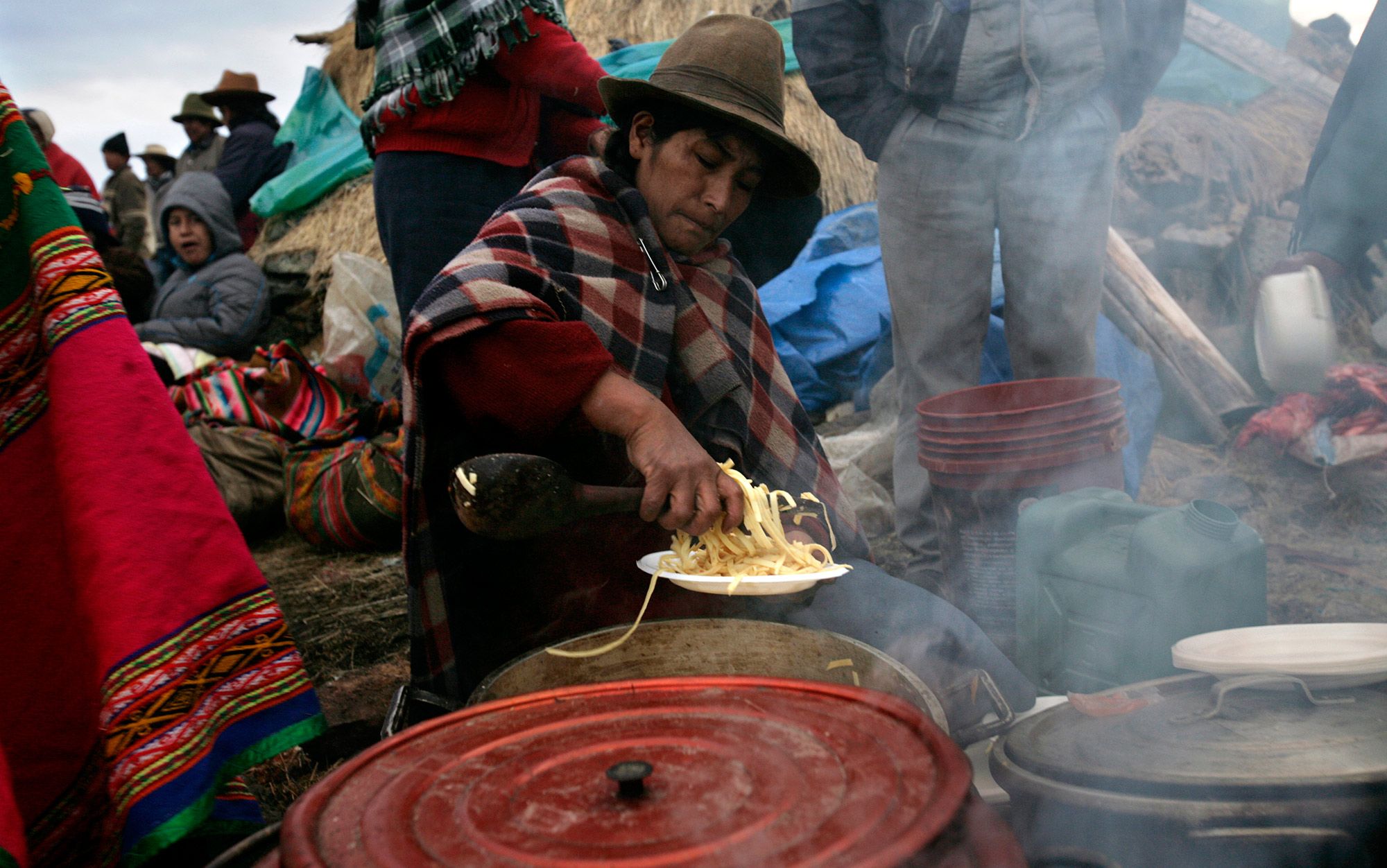 Cooking for Yawar Fiesta celebration in the Peruvian Andes. Photo by Karla Gachet/Panos