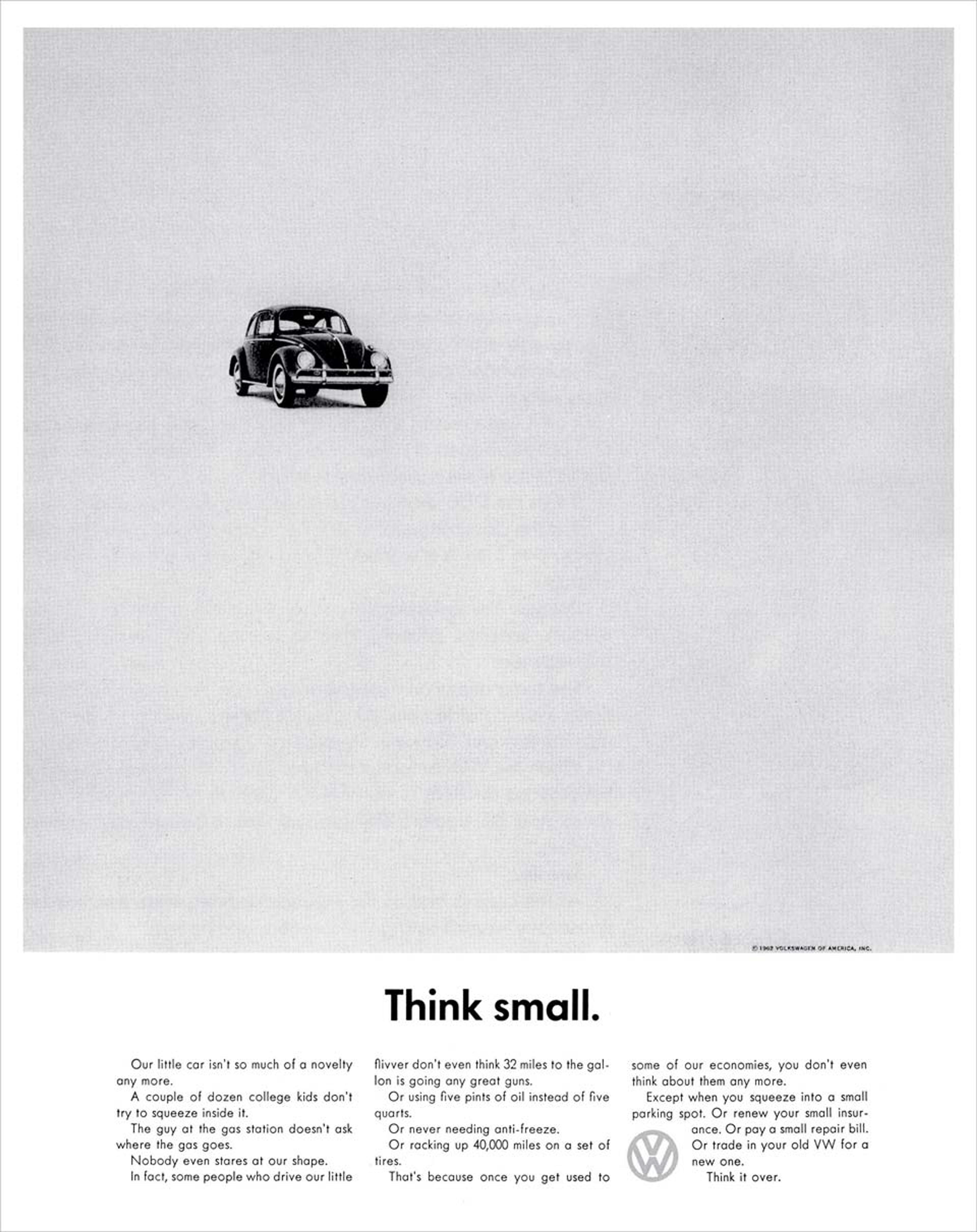 Vintage Volkswagen Beetle advertisement featuring a small image of the car in the centre above the text “Think small.”.