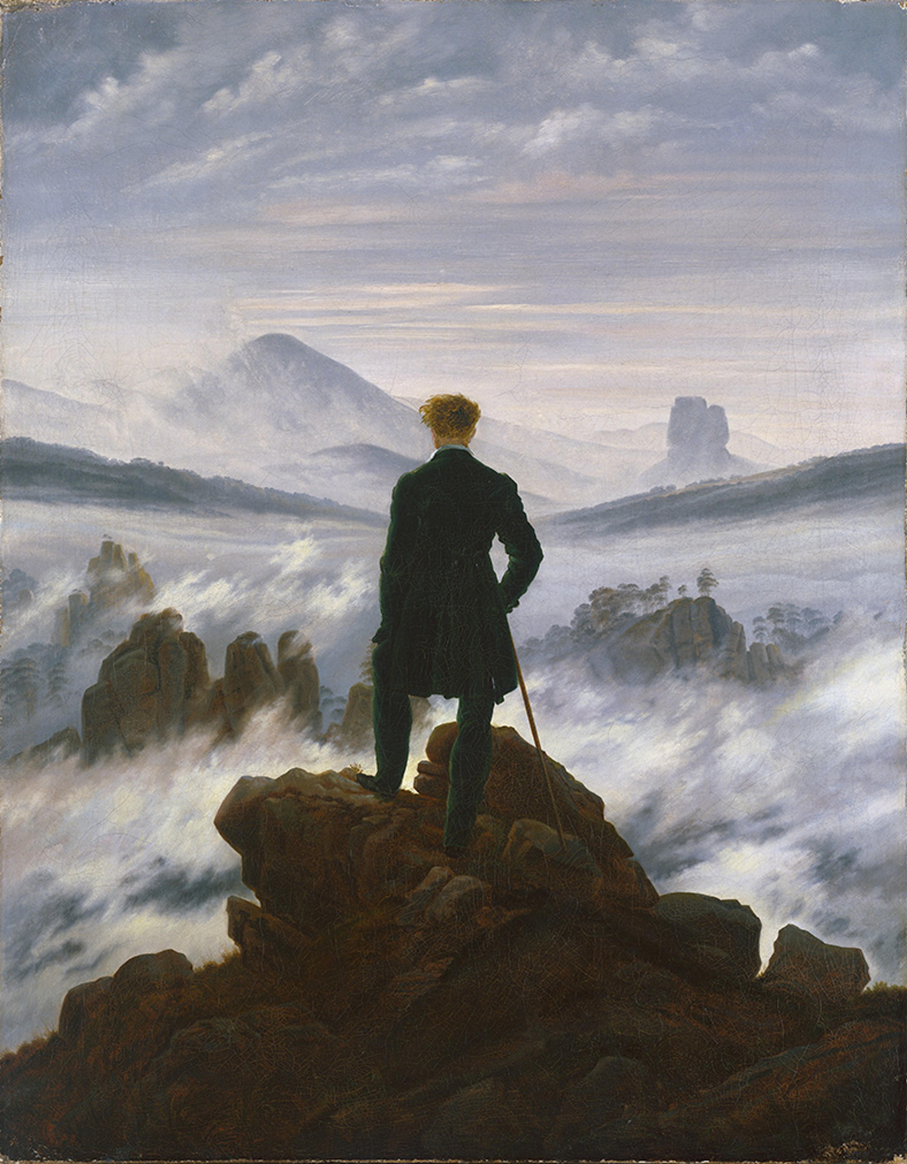 Painting of a man with a cane standing on rocks overlooking a foggy mountain landscape under a cloudy sky.