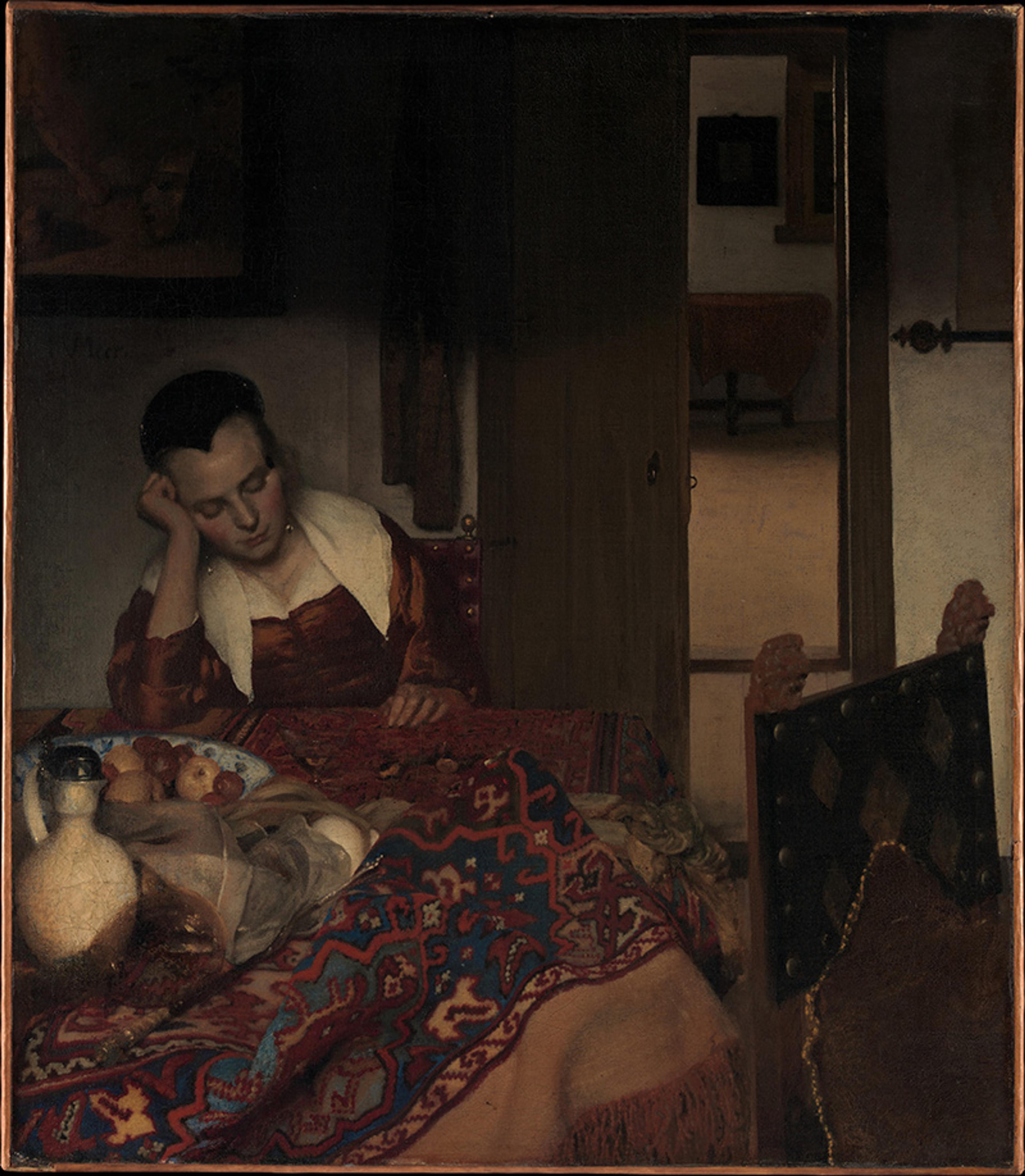 A painting of a woman asleep sitting at a table with a colourful tablecloth, fruit and a jug in a dimly lit room.