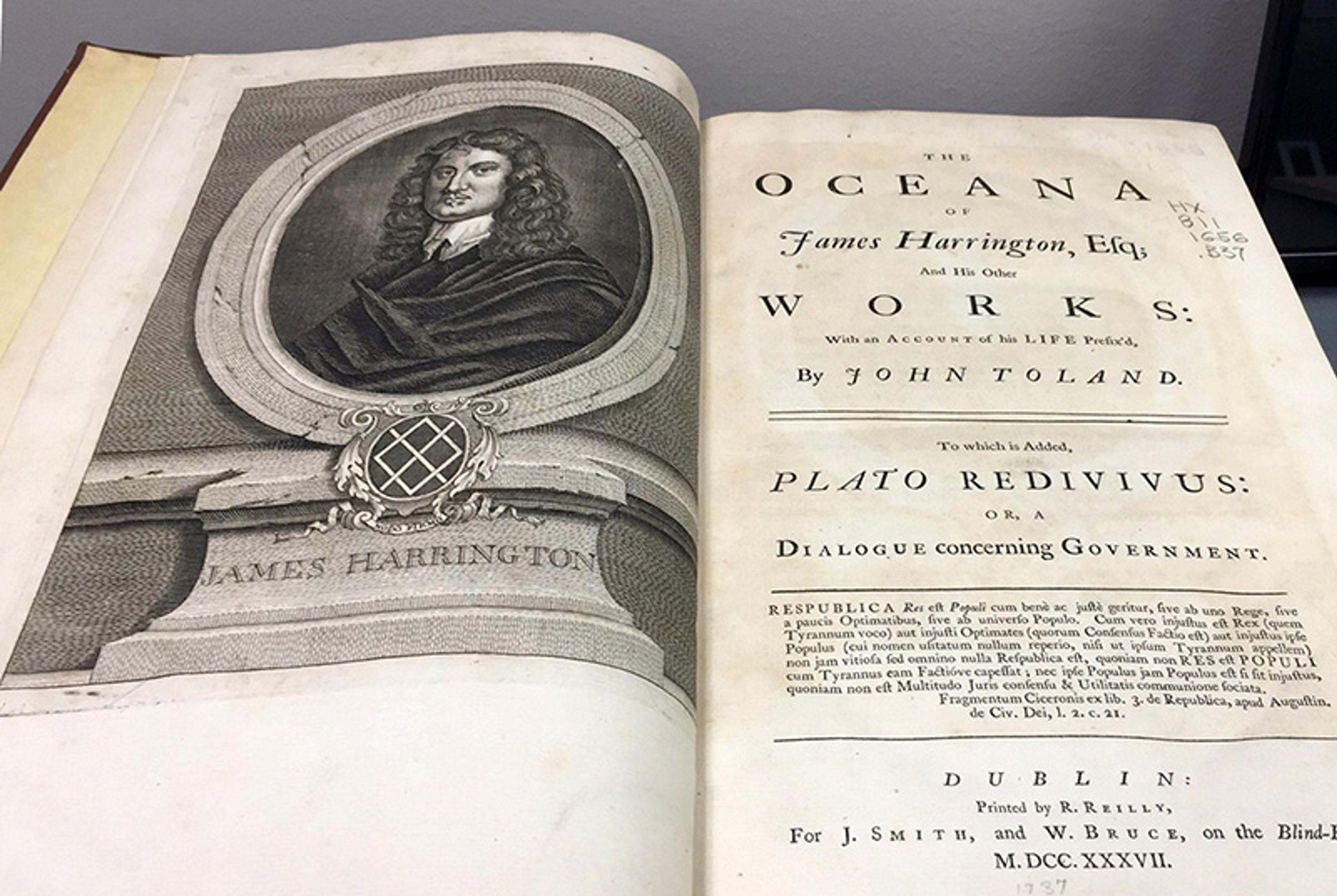 Open book showing a historical text titled “The Oceana” with an engraving of James Harrington on the left page.
